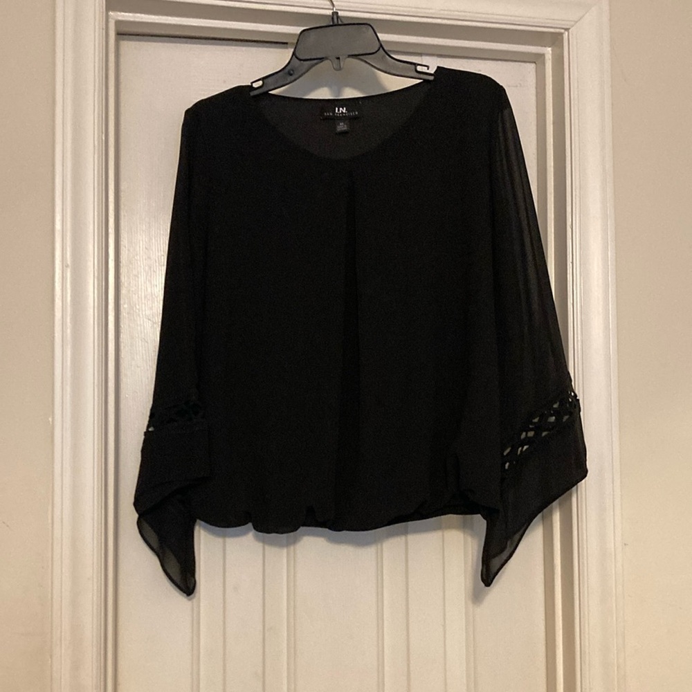 Black top with sheer sleeves